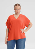 front view of Mat plus size air-wash textured polyester Short Sleeve V-Neck top in Coral