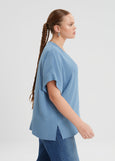 side view of Mat plus size air-wash textured polyester Short Sleeve V-Neck top in indigo