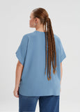back view of Mat plus size air-wash textured polyester Short Sleeve V-Neck top in Indigo