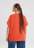 back view of Mat plus size air-wash textured polyester Short Sleeve V-Neck top in Coral