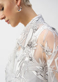 close up front view of plus size Joseph Ribkoff Organza Print Floral Boxy Coverup Cardigan in White/Black