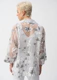 back view of plus size Joseph Ribkoff Organza Print Floral Boxy Coverup Cardigan in White/Black