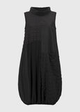 front view of plus size Joseph Ribkoff Bubble Jacquard Sleeveless Mixed Media Cocoon Dress in Black