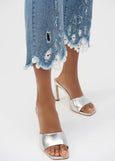 close up view of plus size Joseph Ribkoff Stretch Denim Embroidered Crop Jean