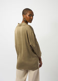 back view of plus size Joseph Ribkoff Recycled Hammered Satin V-Neck Boxy Blouse in Java