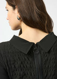 close up back view of plus size Joseph Ribkoff Bubble Jacquard and Silky knit cocoon Dress in Black