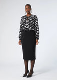 front of plus size Marina Rinaldi Osaka Slim Pencil Flared Skirt in Black