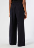 back view of plus size Marina Rinaldi Quota Stretch Knit Drawstring Pant in Midnight