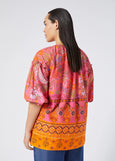 back view of Marina Rinaldi Badess Print Elbow Sleeve cotton Peasant Blouse on plus model in Fuchsia Print