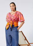 Marina Rinaldi Badess Print Elbow Sleeve cotton Peasant Blouse styled on model with tied waist in Fuchsia Print