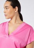 close up front view of Marina Rinaldi Biago V-neck Cotton Interlock Tee in Fuchsia