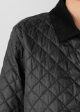 close up front view of plus size Eileen Fisher Eggshell Nylon Classic Collar Jacket W. Cord Collar in Black