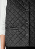 close up front view of plus size Eileen Fisher Eggshell Nylon V-Neck Vest with Snaps in Black