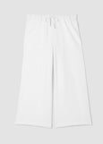Eileen Fisher white pants on a light gray background