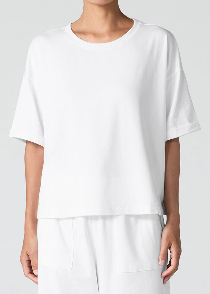 front view of Eileen Fisher plus size organic cotton stretch jersey boxy tee with cuffed Sleeve in colour white