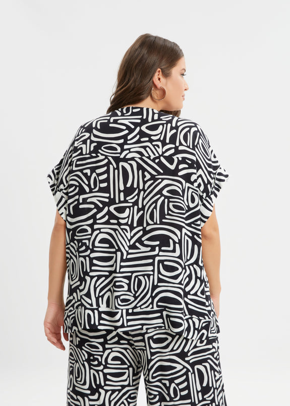 back view of Mat plus size Black and White print Short Sleeve Tunic Top