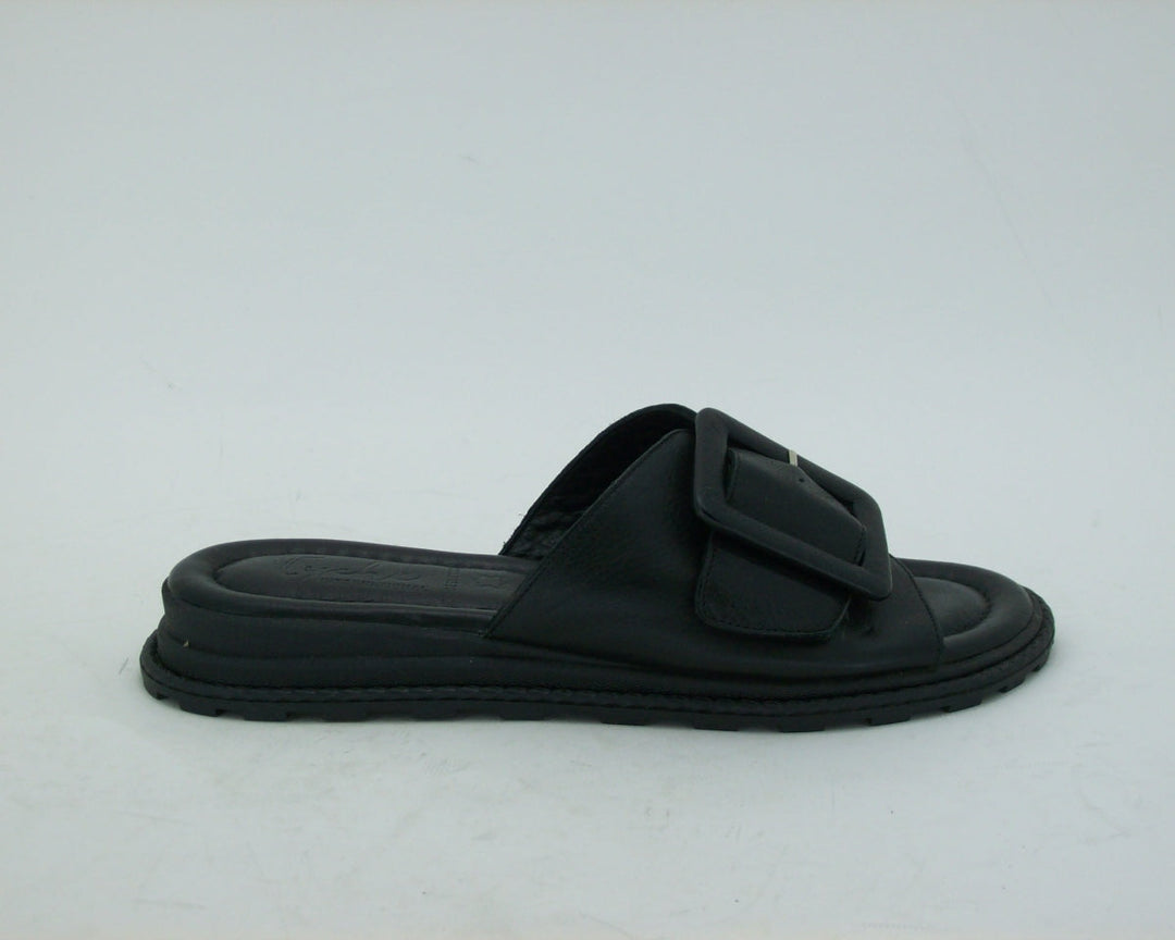 side view of Tyche Monroe leather slide with buckle in black