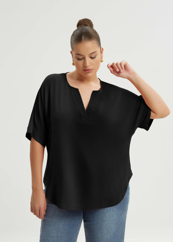 front view of Mat plus size  air-wash texture polyester Split Neck Curved Hem Top in Black