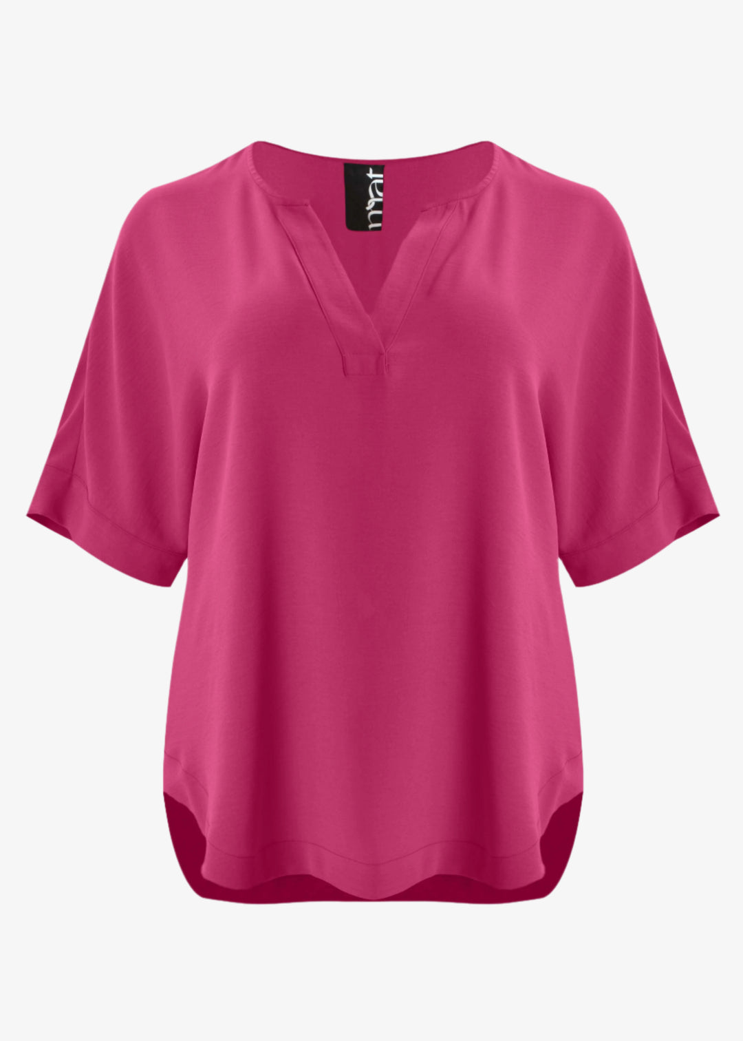 front view of Mat plus size txtured polyester air-wash Split Neck Curved Hem Top in Fuchsia