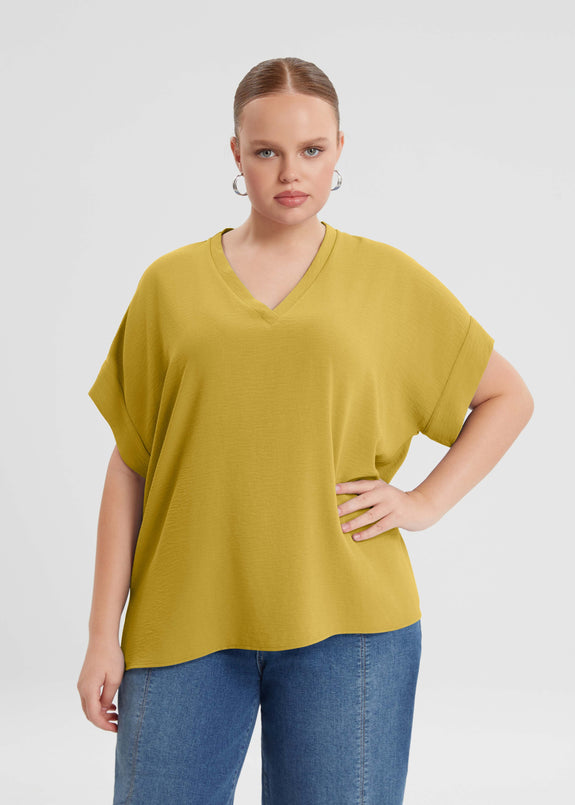 front view of Mat plus size air-wash textured polyester Short Sleeve V-Neck top in Dijon