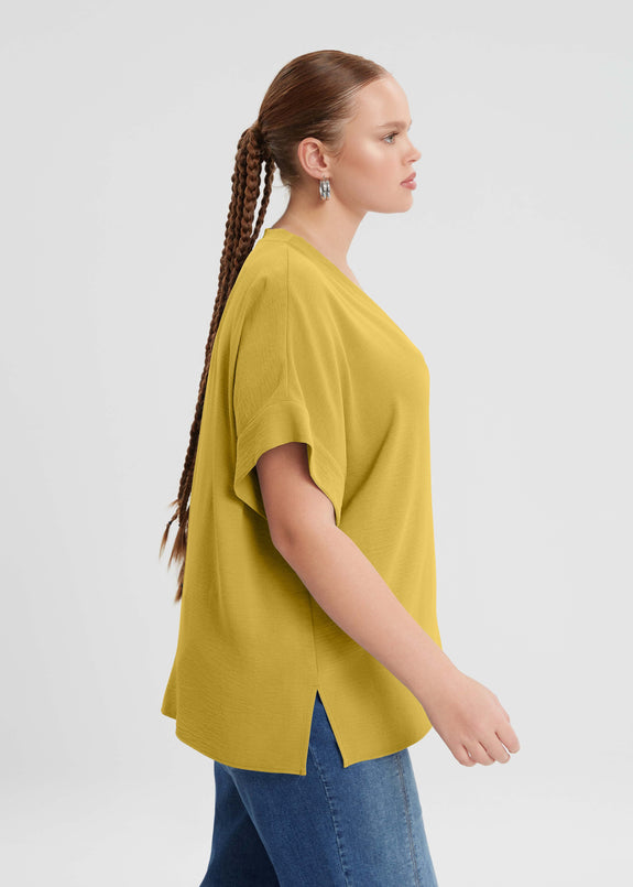 side view of Mat plus size air-wash textured polyester Short Sleeve V-Neck top in Dijon