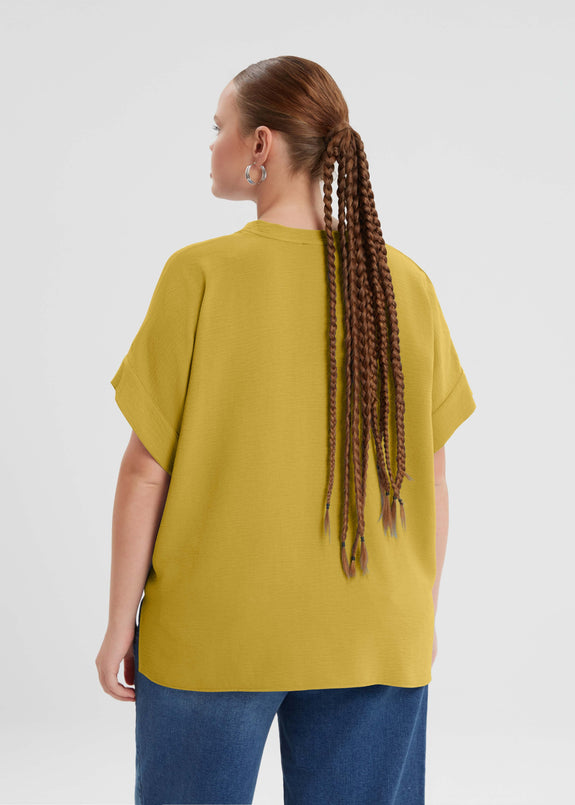 back view of Mat plus size air-wash textured polyester Short Sleeve V-Neck top in Dijon