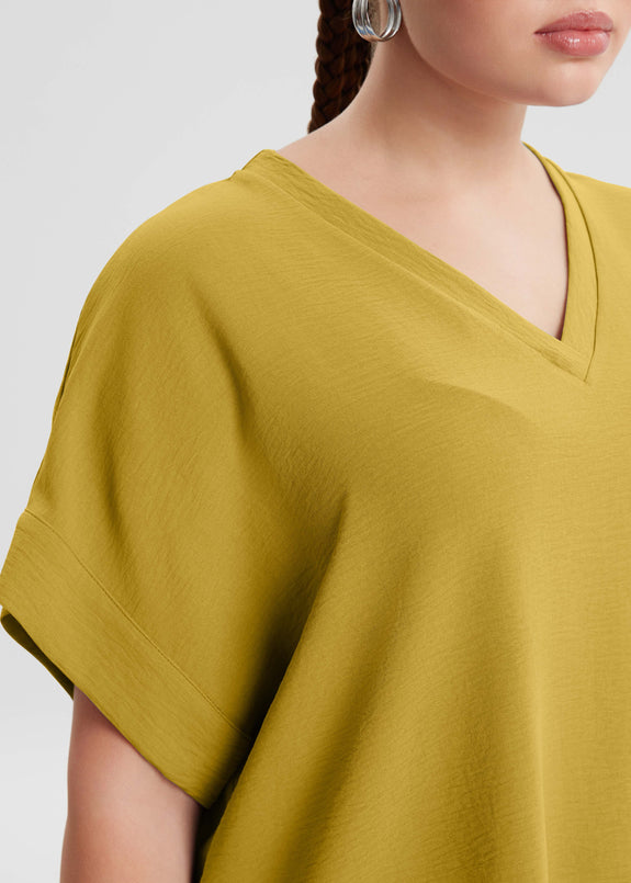 close up front view of Mat plus size air-wash textured polyester Short Sleeve V-Neck top in Dijon
