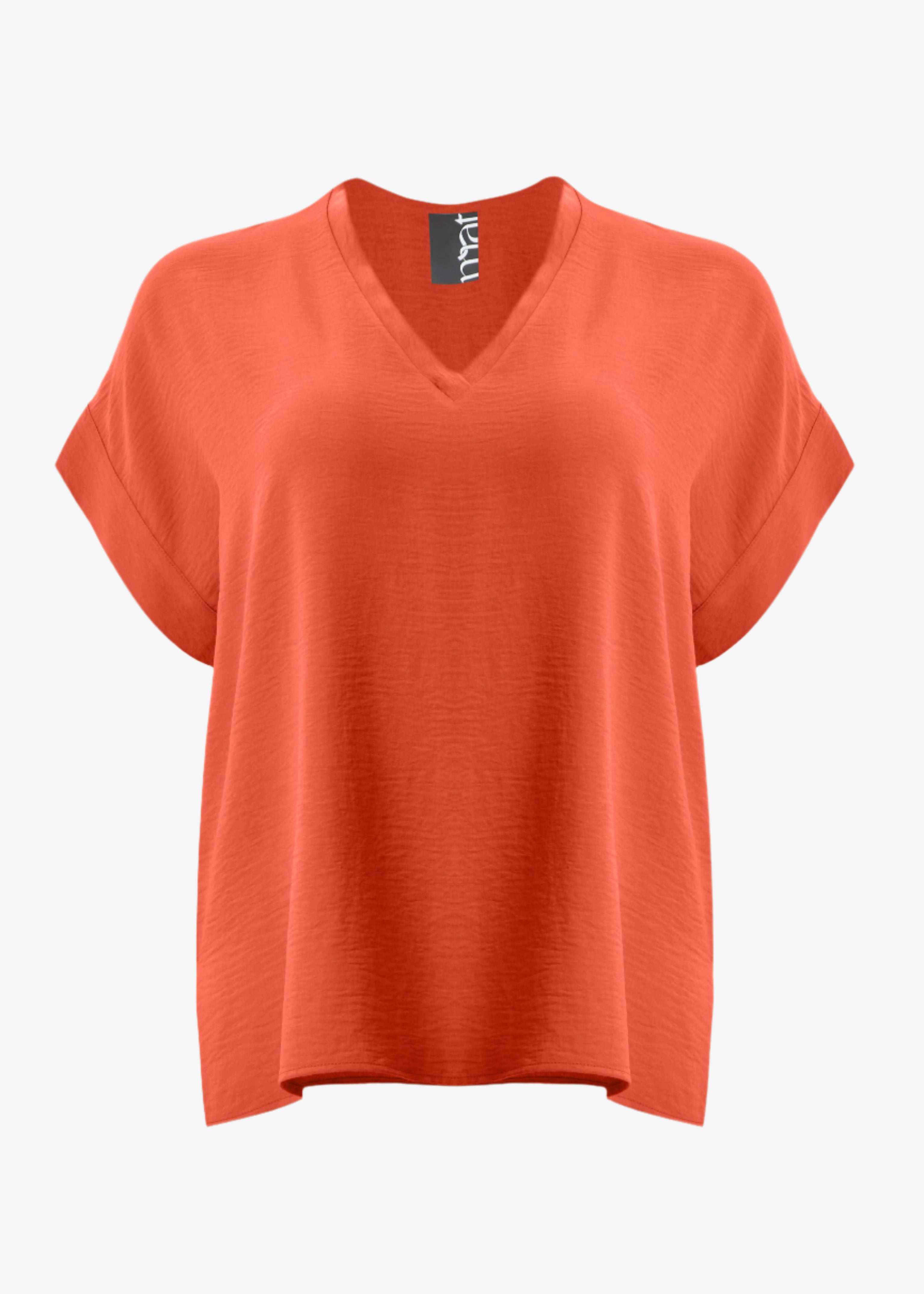 front view of Mat plus size air-wash textured polyester Short Sleeve V-Neck top in Coral