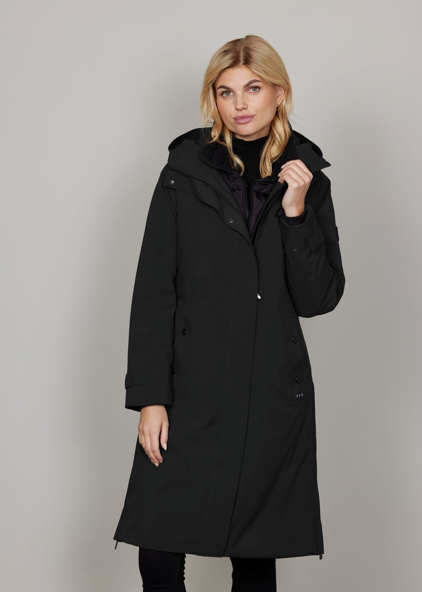 front view of plus size Junge Mira 2 for 1 Zip front Coat with Quilted vest in Black