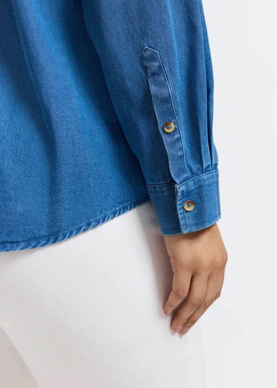 close up view of Foxcroft Tencel Blend Hampton Long Sleeve Chambray plus size Shirt in Medium Wash
