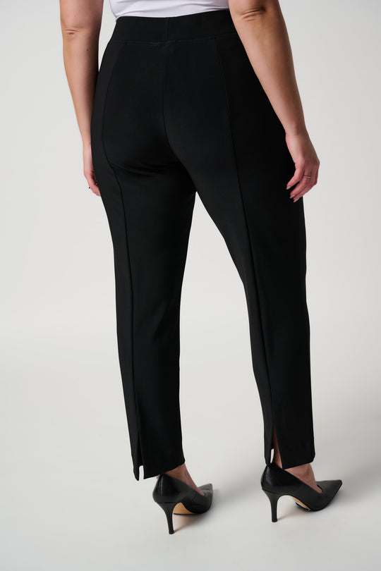 Black slim fit pants with back seam and tapered ankle-length legs