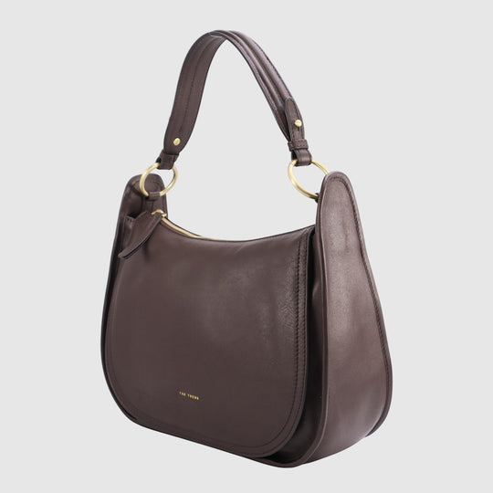 Dark brown slouch shoulder bag with two top handles and gold-tone rings.