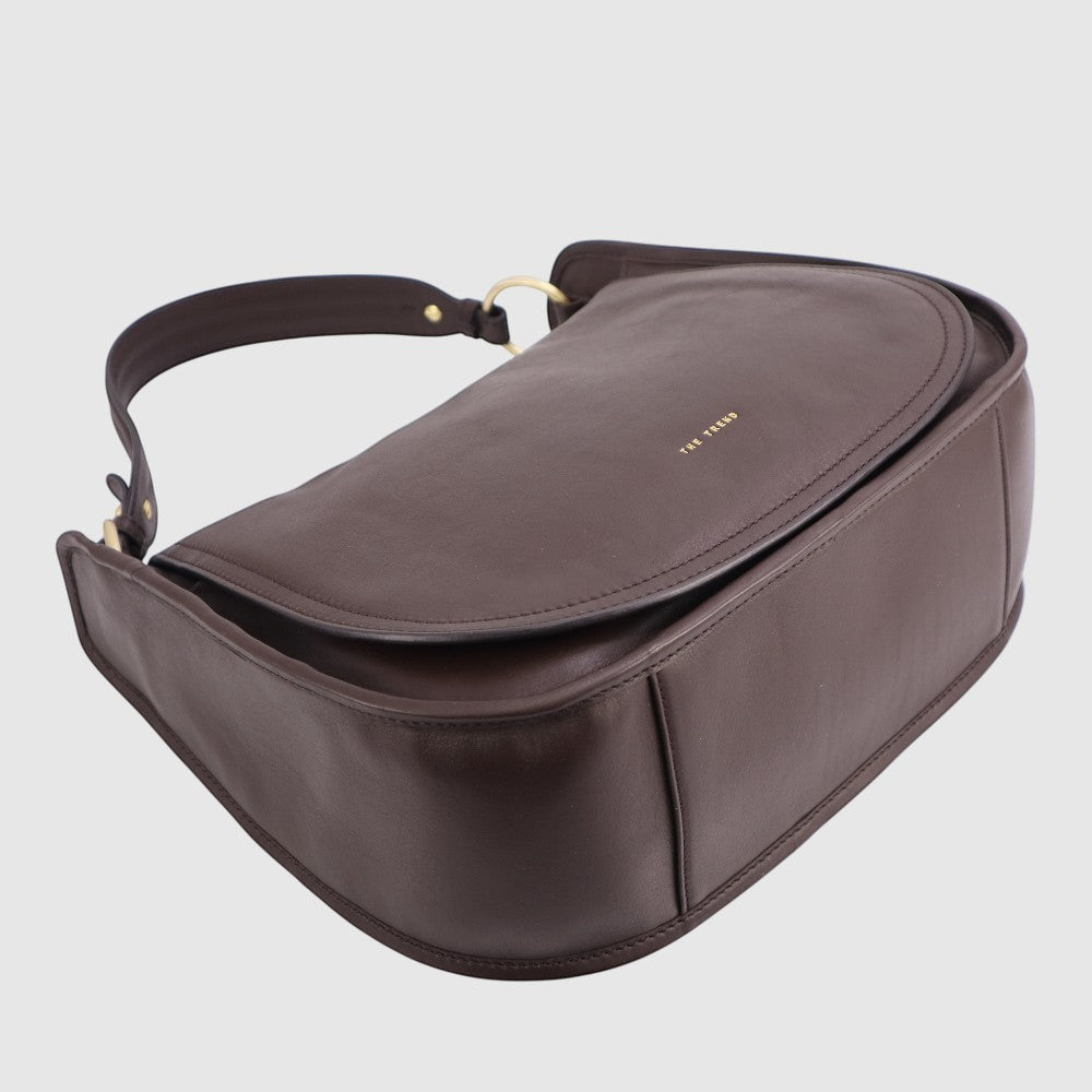 Dark brown hobo bag with top zip closure, curved flap, and gold-tone hardware.