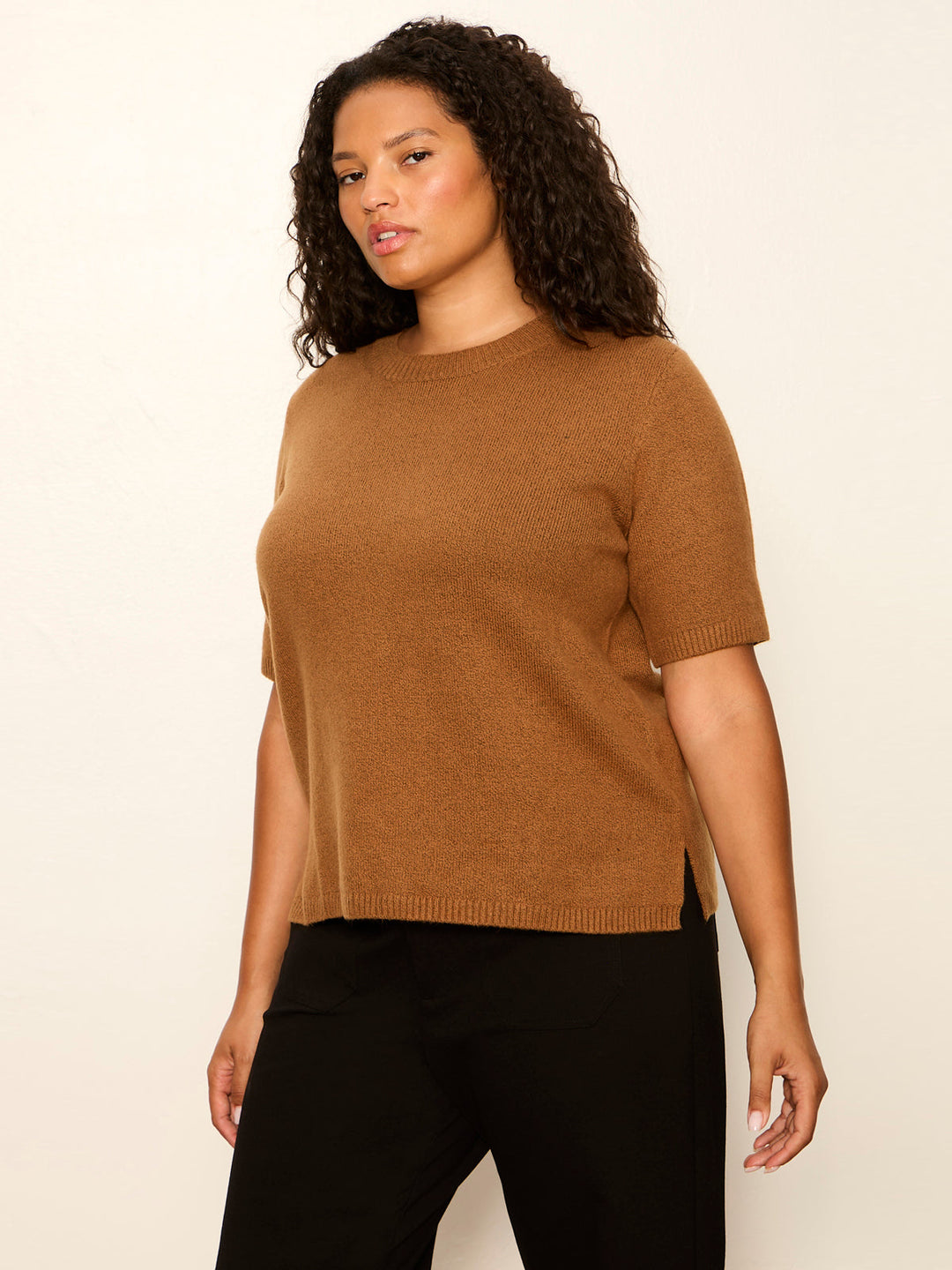 Brown knit short-sleeve tee with ribbed jewel crew neck, side-slit hem
