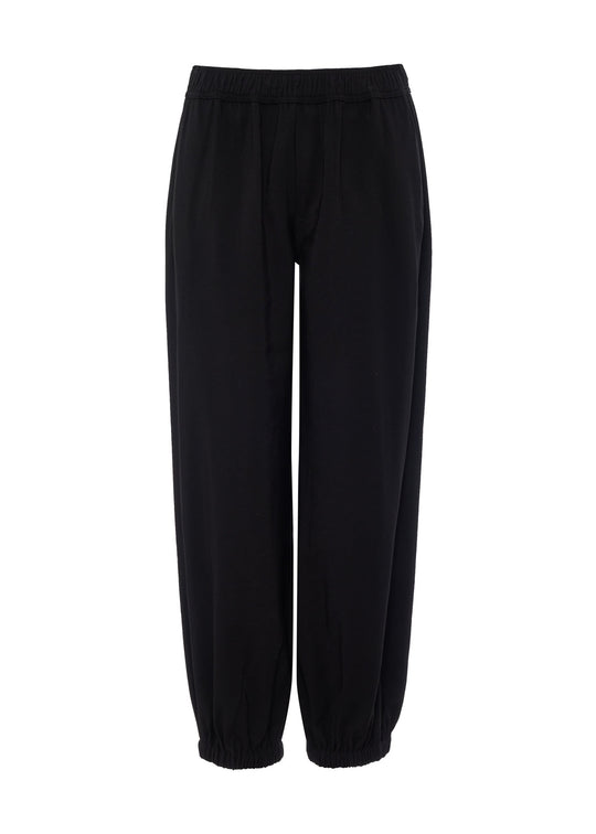 Black balloon jogger pants with elastic waistband and gathered ankle cuffs, front view