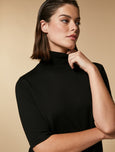 Marina Rinaldi Alfa Extra Fine Merino Short Sleeve Turtleneck Sweater in Black