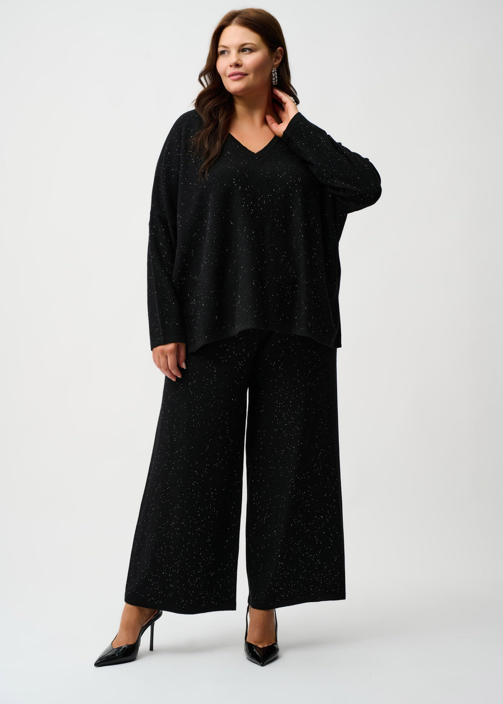 front view of plus size Joseph Ribkoff Sweater Knit culotte Pant with Drawstring Waist in Black