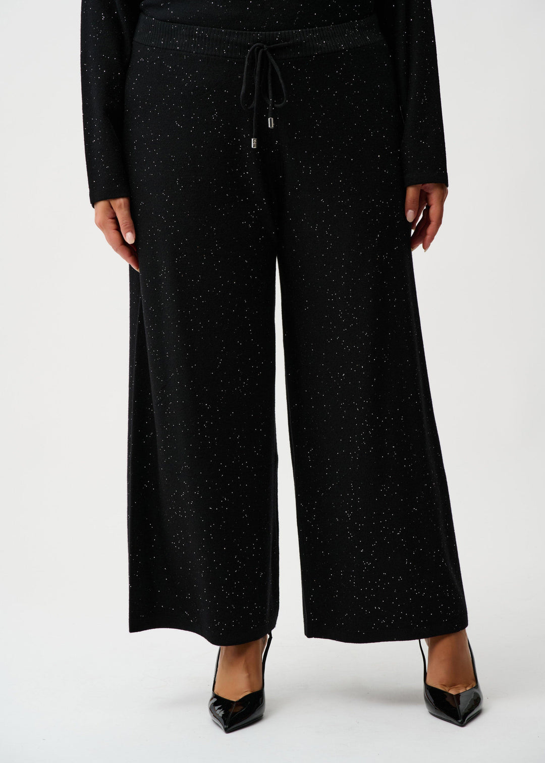 front view of plus size Joseph Ribkoff Sweater Knit culotte Pant with Drawstring Waist in Black