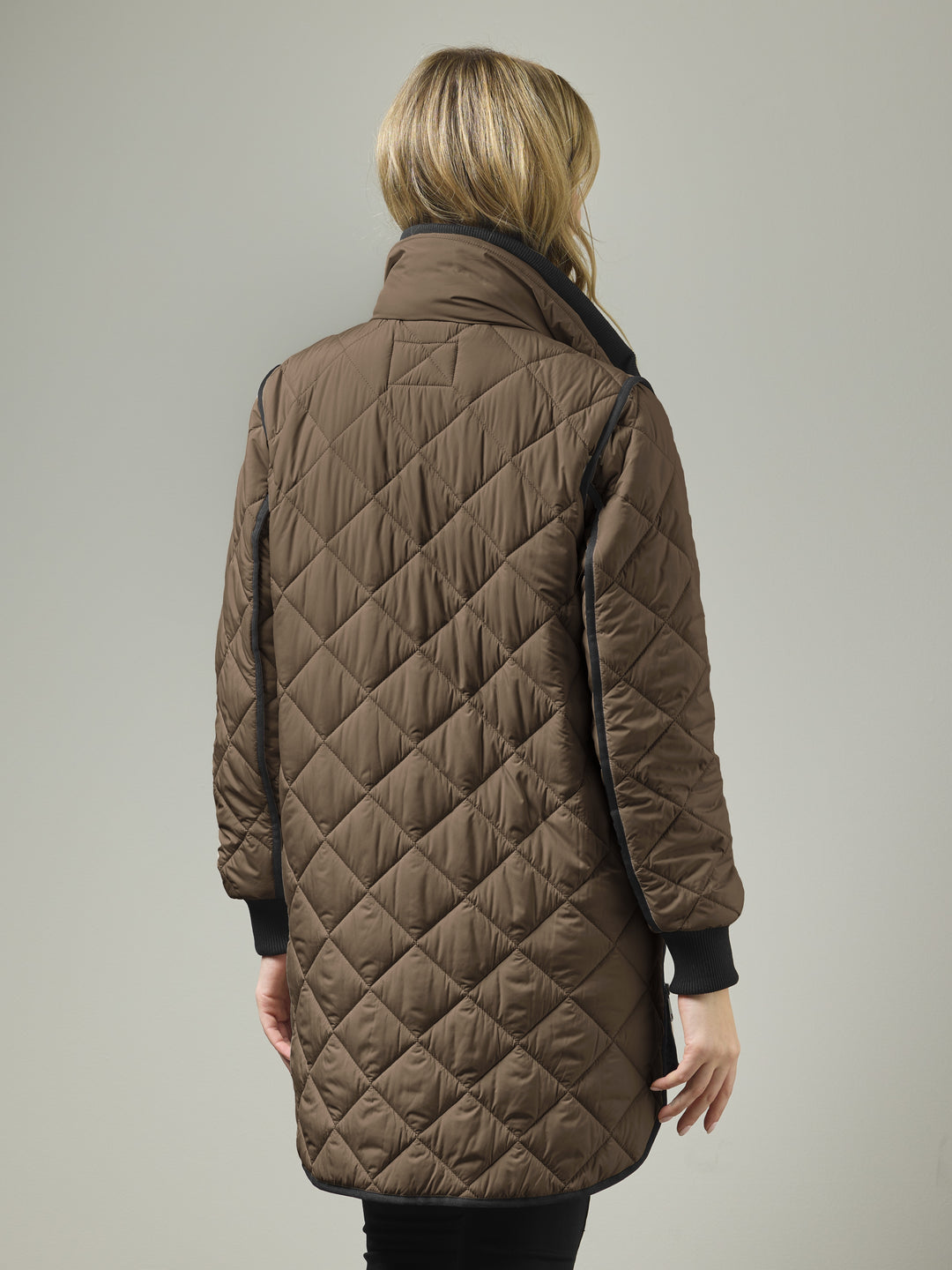Mocha quilted knee-length coat, diamond stitching, black hem and sleeve storm cuffs