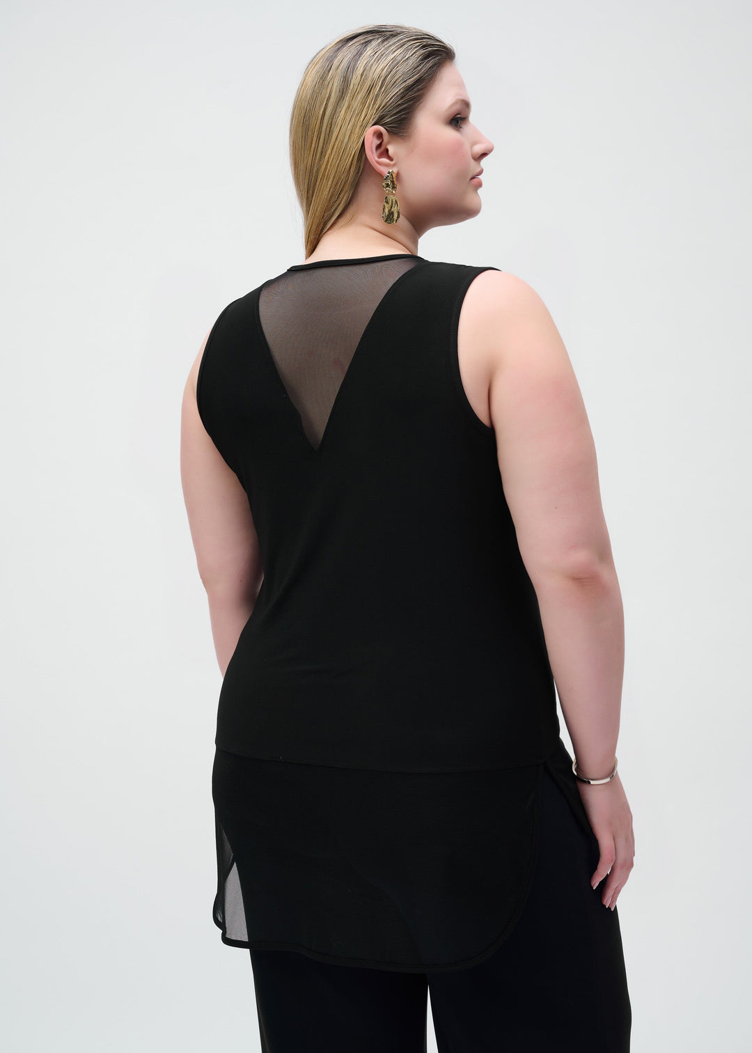 back  view of plus size Joseph Ribkoff Silky Knit and Mesh Tank Top with Curved Hem in Black