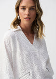 close up front view of plus size Joseph Ribkoff Seersucker Boxy Hi-Lo top in White