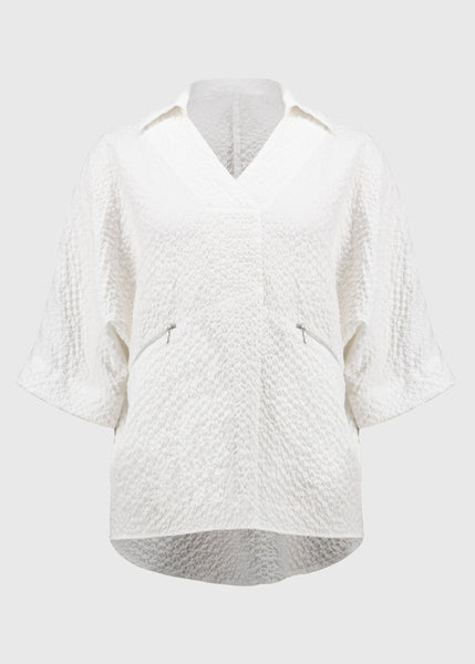 front view of plus size Joseph Ribkoff Seersucker Boxy Hi-Lo top in White
