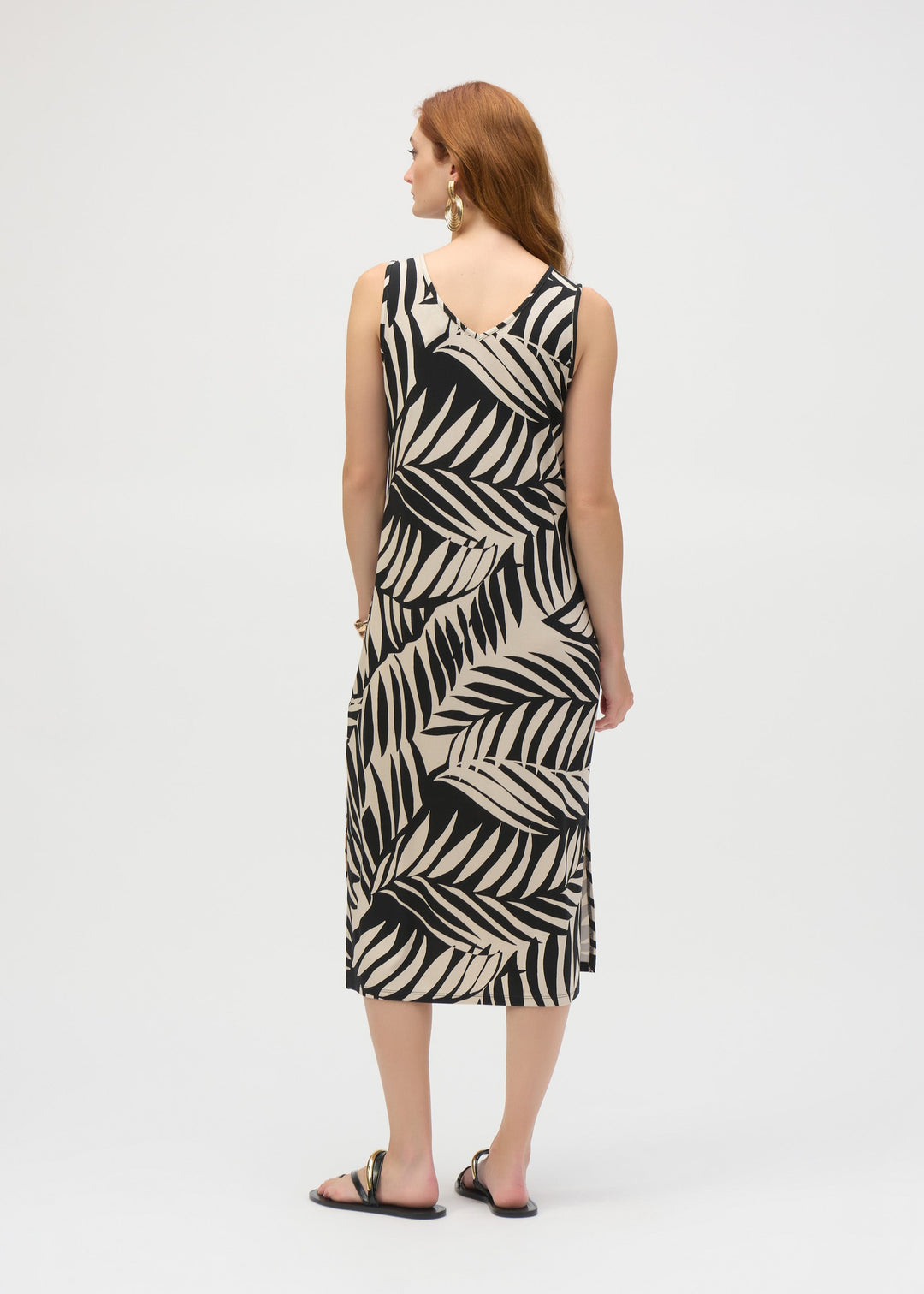 back view of plus size Joseph Ribkoff Jersey Tropical Print A-line Dress in Blk/Moonstone