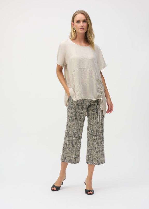 front view of plus size Joseph Ribkoff Millenium Geo Print Pull On Culotte crop Pant in Blk/Beige