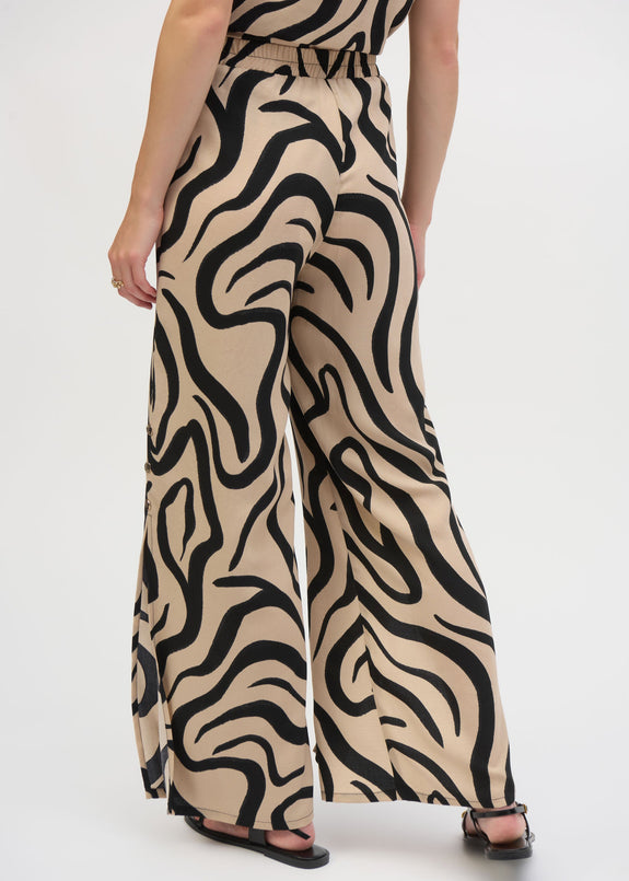 back view of plus size Joseph Ribkoff Gauze Abstract Print Wide Leg Pant in Beige/Black