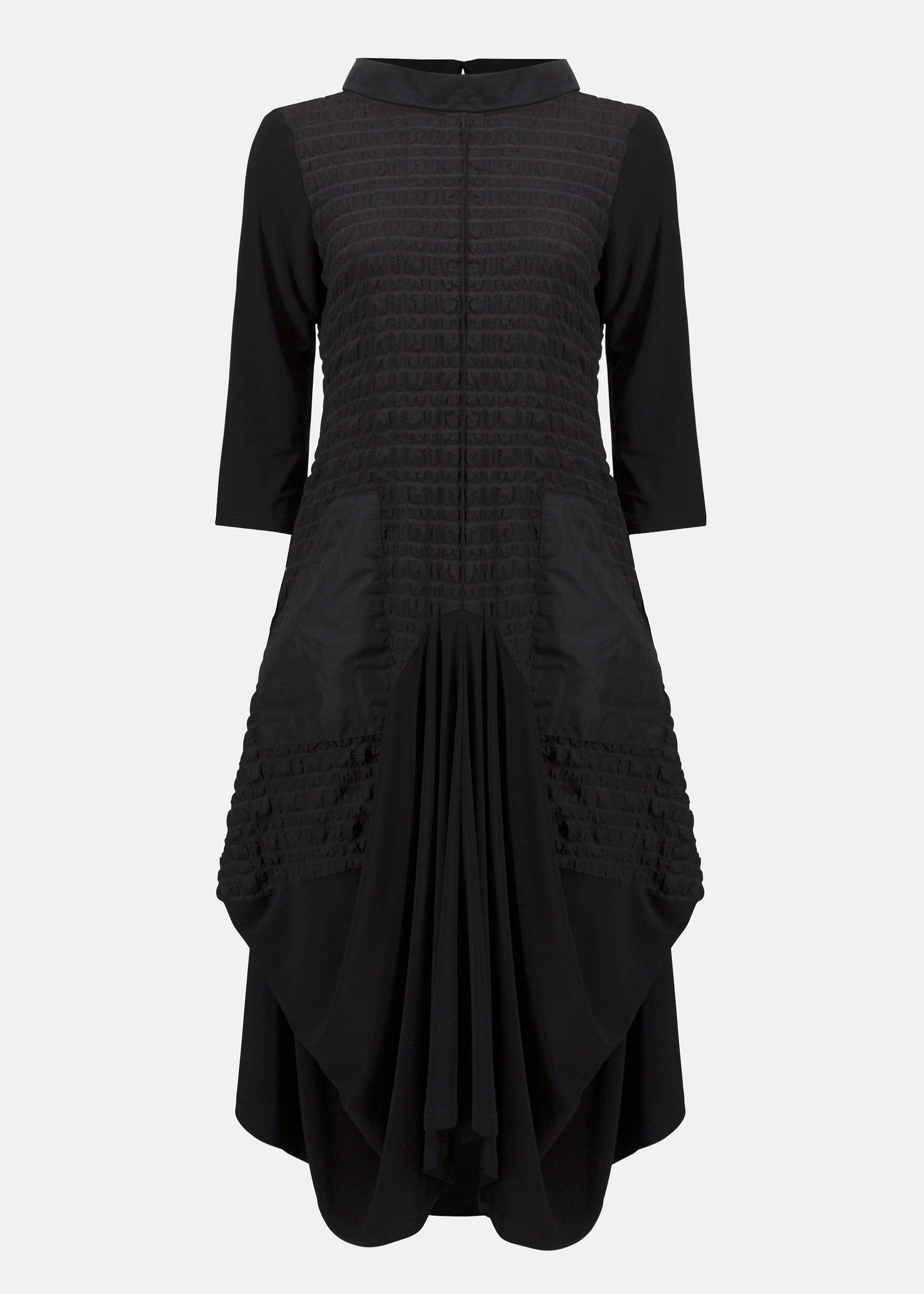 front view of plus size Joseph Ribkoff Bubble Jacquard and Silky knit cocoon Dress in Black