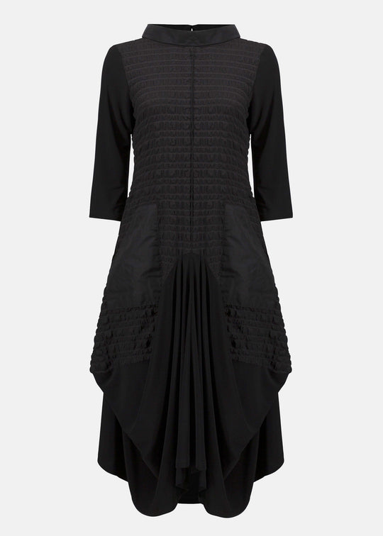front view of plus size Joseph Ribkoff Bubble Jacquard and Silky knit cocoon Dress in Black