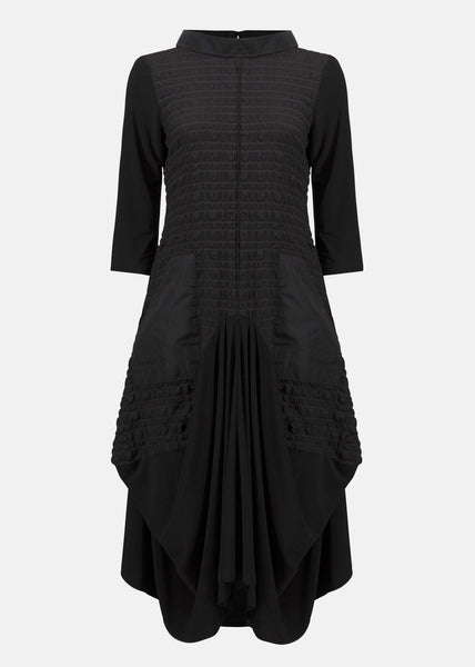 front view of plus size Joseph Ribkoff Bubble Jacquard and Silky knit cocoon Dress in Black