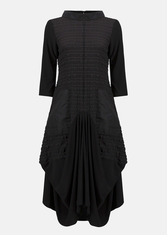 front view of plus size Joseph Ribkoff Bubble Jacquard and Silky knit cocoon Dress in Black