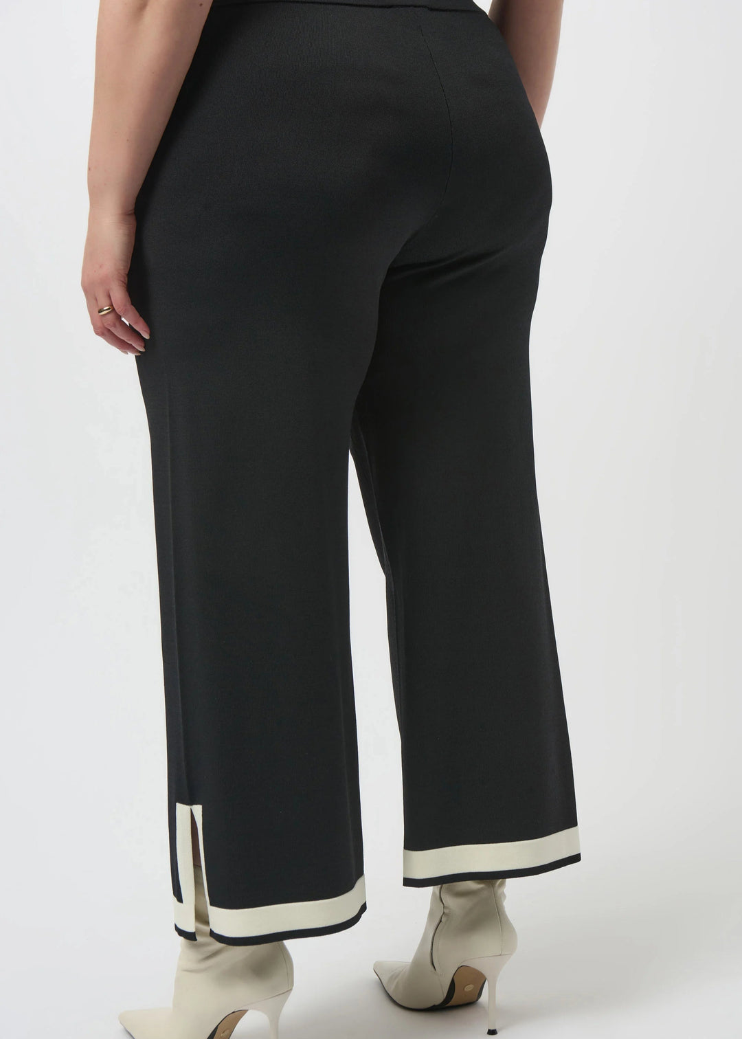 back  view of plus size Joseph Ribkoff Sweater Knit Color Block Pant in Black/Vanilla
